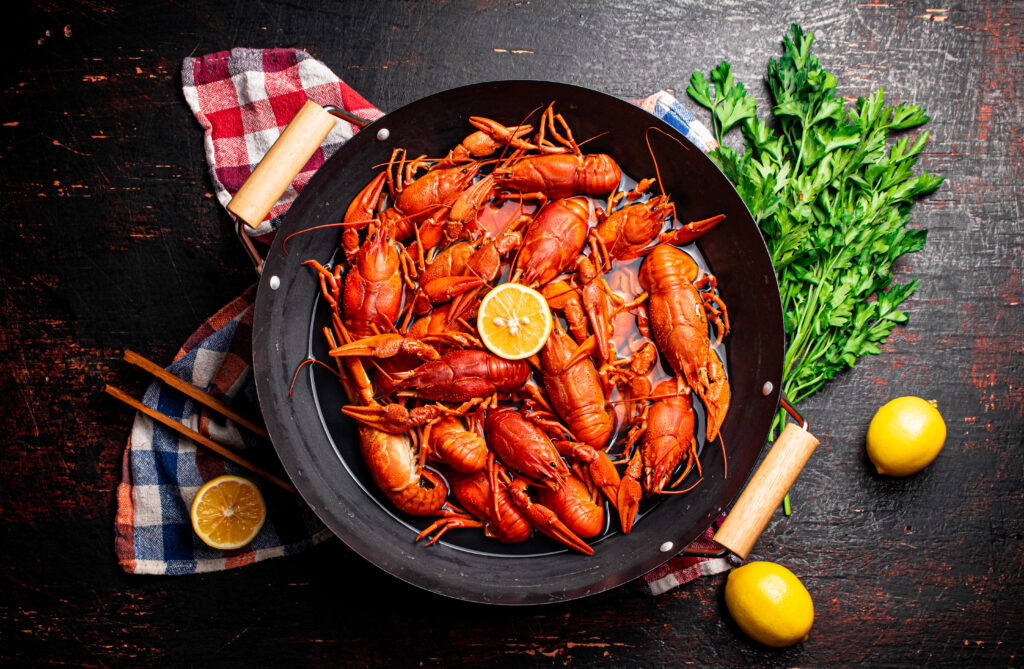 A pot of boiled crayfish on a napkin.